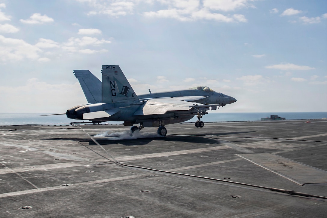 An F/A-18E Super Hornet, attached to Strike Fighter Squadron (VFA) 14, makes an arrested landing on the flight deck of Nimitz-class aircraft carrier USS Abraham Lincoln (CVN 72) in support of Operation Epic Fury, March 3, 2026. (U.S. Navy photo)
