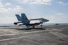 An F/A-18E Super Hornet, attached to Strike Fighter Squadron (VFA) 14, makes an arrested landing on the flight deck of Nimitz-class aircraft carrier USS Abraham Lincoln (CVN 72) in support of Operation Epic Fury, March 3, 2026. (U.S. Navy photo)