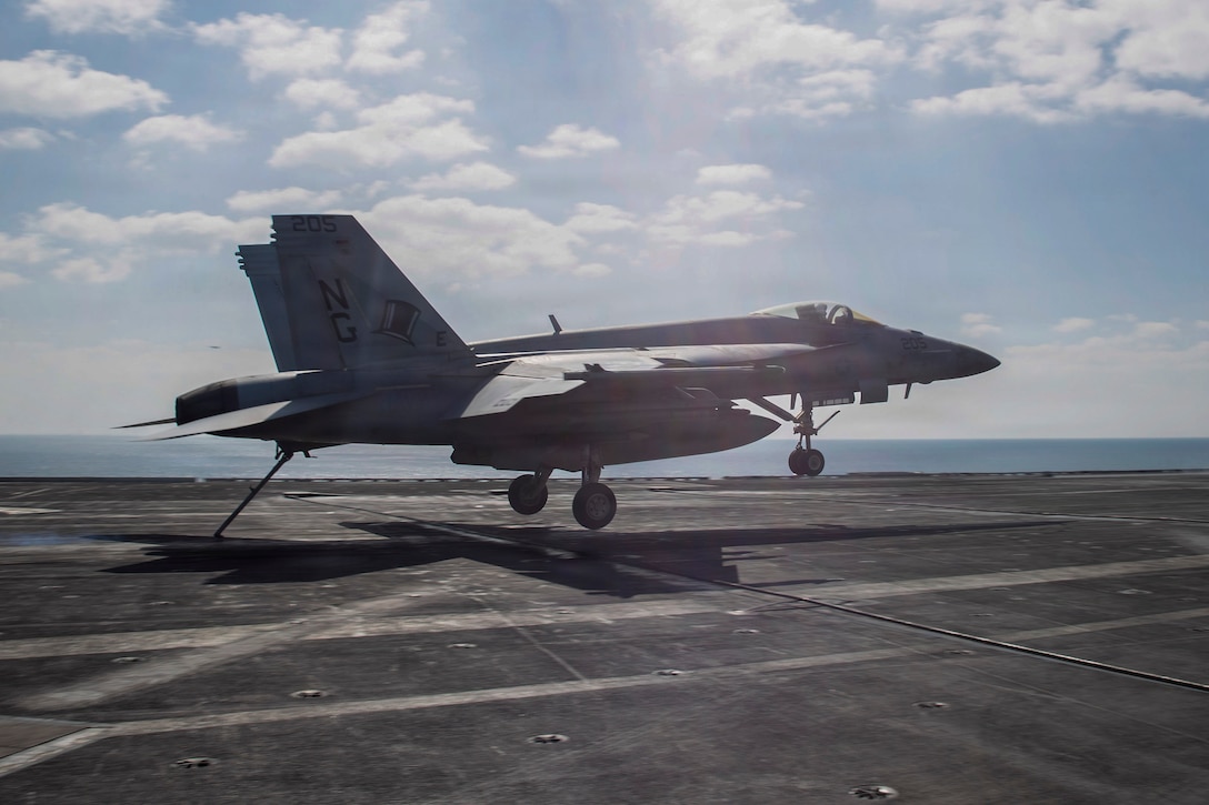 An F/A-18E Super Hornet, attached to Strike Fighter Squadron (VFA) 14, makes an arrested landing on the flight deck of Nimitz-class aircraft carrier USS Abraham Lincoln (CVN 72) in support of Operation Epic Fury, March 3, 2026. (U.S. Navy photo)