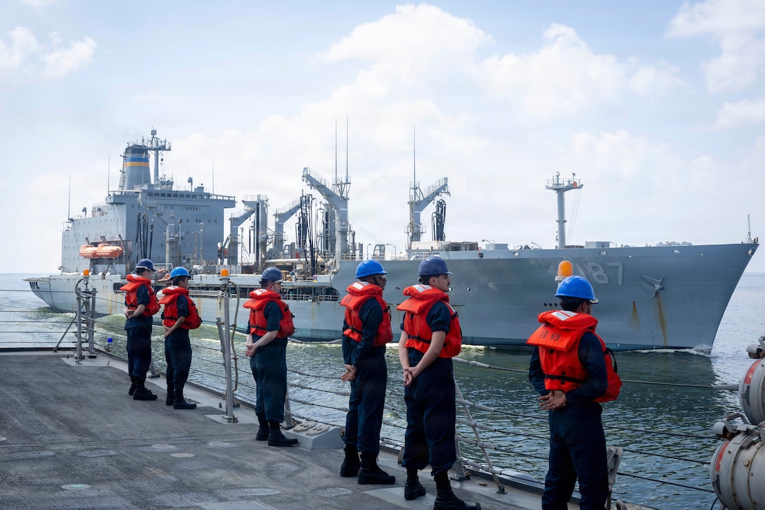 U.S. Sailors, assigned to Arleigh Burke-class guided-missile destroyer USS Delbert D. Black (DDG 119), participate in a replenishment-at-sea with fleet replenishment oiler USNS Henry J. Kaiser (T- AO 187), in the U.S. Central Command area of responsibility in support of Operation Epic Fury, Mar. 3, 2026. (U.S. Navy photo)
