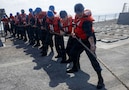 U.S. Sailors, assigned to Arleigh Burke-class guided-missile destroyer USS Delbert D. Black (DDG 119), heave a line during a replenishment-at-sea with fleet replenishment oiler USNS Henry J. Kaiser (T- AO 187), in the U.S. Central Command area of responsibility in support of Operation Epic Fury, Mar. 3, 2026. (U.S. Navy photo)