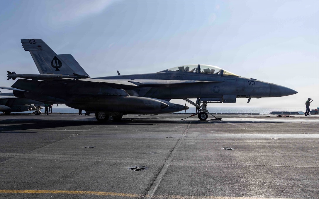An F/A-18F Super Hornet, attached to Strike Fighter Squadron (VFA) 41, prepares to launch from the flight deck of Nimitz-class aircraft carrier USS Abraham Lincoln (CVN 72) in support of Operation Epic Fury, March 4, 2026. (U.S. Navy photo)