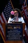 Karena Lyons, Pacific Community director of partnership, integration and resource mobilization, delivers remarks at the 36th annual international Military Law and Operations strategic engagement to leaders from more than 30 nations in Honolulu, Hawaii, Sept. 10, 2025