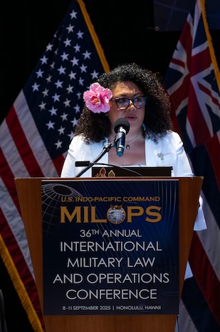 Karena Lyons, Pacific Community director of partnership, integration and resource mobilization, delivers remarks at the 36th annual international Military Law and Operations strategic engagement to leaders from more than 30 nations in Honolulu, Hawaii, Sept. 10, 2025