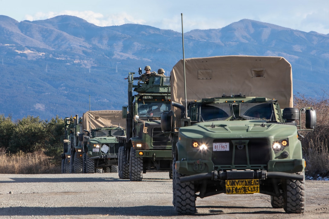 U.S. Marines with Marine Wing Support Squadron (MWSS) 171, Marine Aircraft Group 12, 1st Marine Aircraft Wing, conduct a simulated convoy at Combined Arms Training Center, Camp Fuji, Japan, Jan. 25, 2026.MWSS-171 training consisted of company level field exercises with rifle and machine gun ranges, day and night convoy operations, and general fieldcraft training to maintain mission readiness. (U.S. Marine Corps photo by Lance Cpl. Maikeyla Reyes)