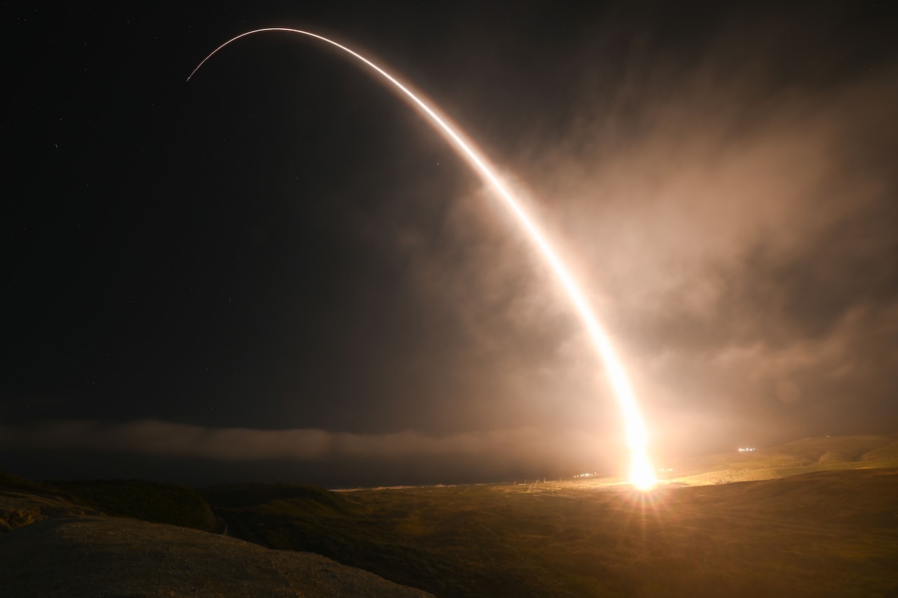 A ICBM launches at night.