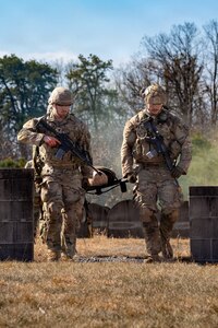 U.S. Soldiers participate in a culminating event exercise as a part of the 68W Healthcare Specialist Military Occupational Specialty Transition course at Fort Indiantown Gap, Pennsylvania, March 1, 2026. The course is conducted by the 166th Regiment - Regional Training Institute's Medical Battalion Training Site and prepares Soldiers to be combat medics. (U.S. Army National Guard photo by Sgt. Kayden Bedwell)