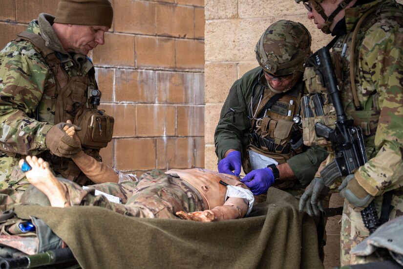 U.S. Soldiers participate in a culminating event exercise as a part of the 68W Healthcare Specialist Military Occupational Specialty Transition course at Fort Indiantown Gap, Pennsylvania, March 1, 2026. The course is conducted by the 166th Regiment - Regional Training Institute's Medical Battalion Training Site and prepares Soldiers to be combat medics. (U.S. Army National Guard photo by Sgt. Kayden Bedwell)