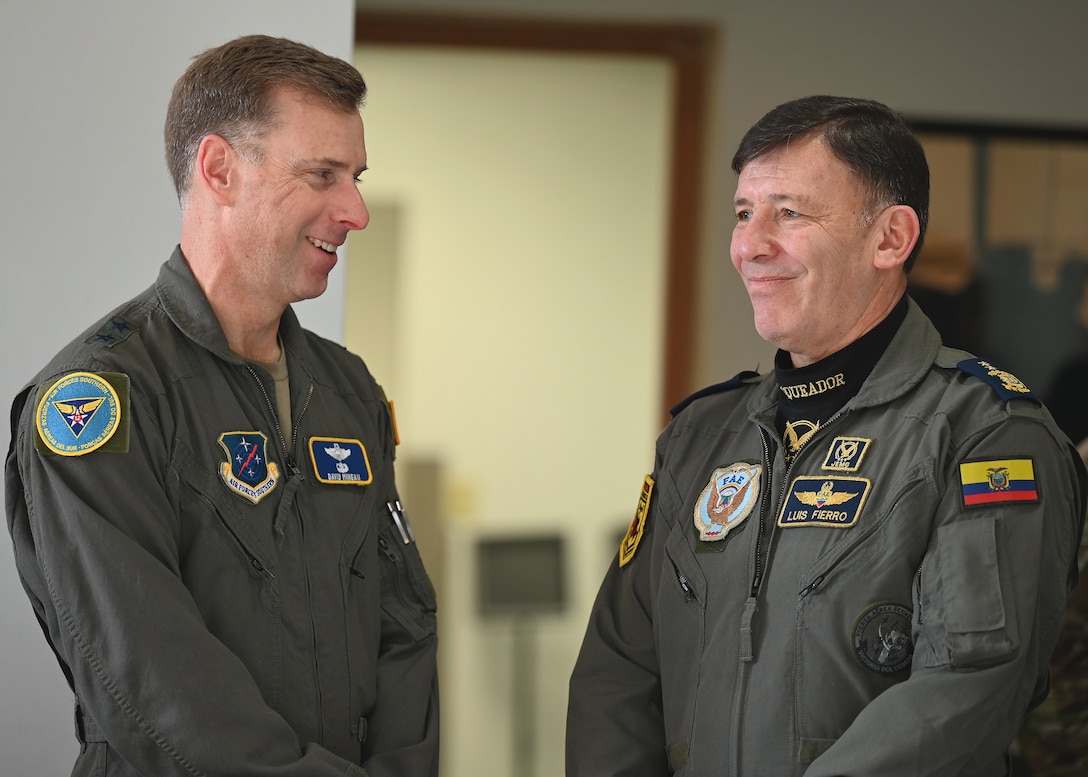 U.S. Air Force Maj. Gen. David Mineau, left, Air Forces Southern commander, interacts with Fuerza Aérea Ecuatoriana (FAE) Maj. Gen. Luis Fierro Urresta, Ecuadorian air force chief of staff, during the U.S. and Ecuadorian Airman-to-Airman staff talks, at Davis-Monthan Air Force Base, Arizona, March 3, 2026. AFSOUTH personnel met with Ecuadorian Air Force officials for an annual headquarters staff talks to review shared security cooperation goals and strengthen U.S.–FAE partnership and interoperability. (U.S. Air Force photo by Staff Sgt. Abbey Rieves)