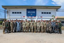 U.S. Army Gen. Xavier T. Brunson, commander of United Nations Command, Combined Forces Command, and U.S. Forces Korea, and Command Sgt. Maj. Robin Bolmer, senior enlisted leader of UNC, CFC, and USFK, pose for a photo with service members from the U.S., Singapore, Indonesia, South Korea, Japan, and Thailand at Camp Red Horse, Thailand, March 2, 2026.