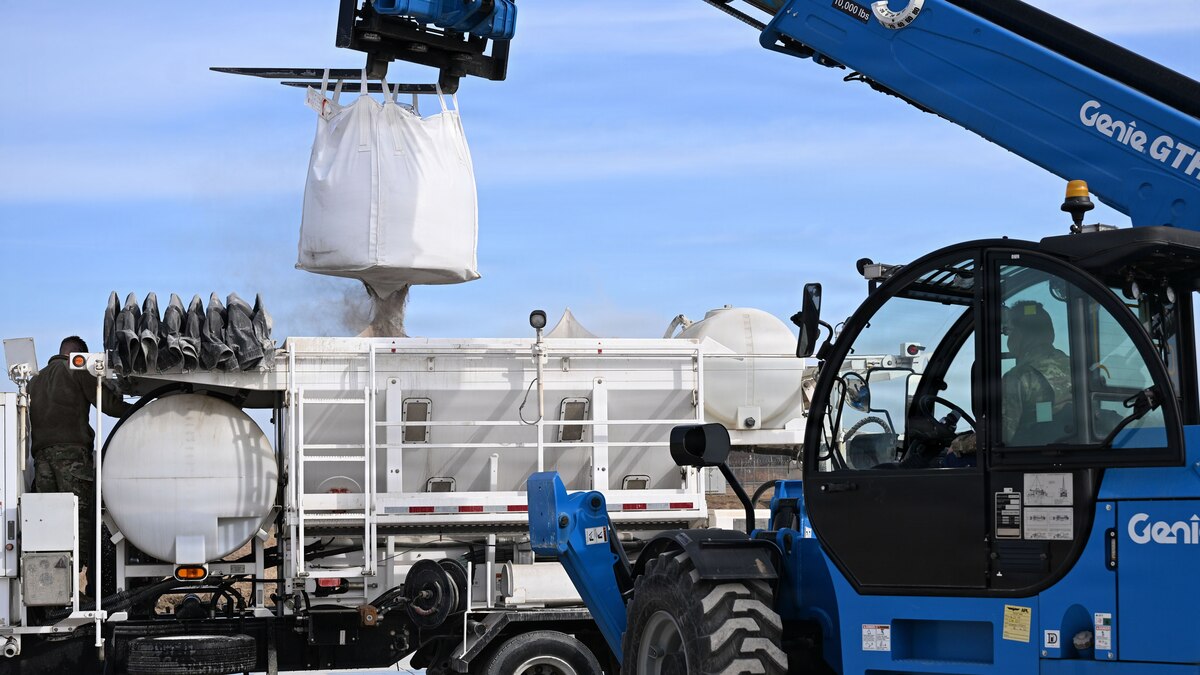 U.S. Air Force Airmen assigned to the 51st Civil Engineer Squadron mix concrete powder and water in a volumetric mixer during Rapid Osan Airfield Recovery training at Osan Air Base, Republic of Korea, Feb. 26, 2026. The training evaluated ROAR, an installation-specific method focused on restoring minimum runway capability quickly during contingency operations. (U.S. Air Force photo by Senior Airman Rome Bowermaster)