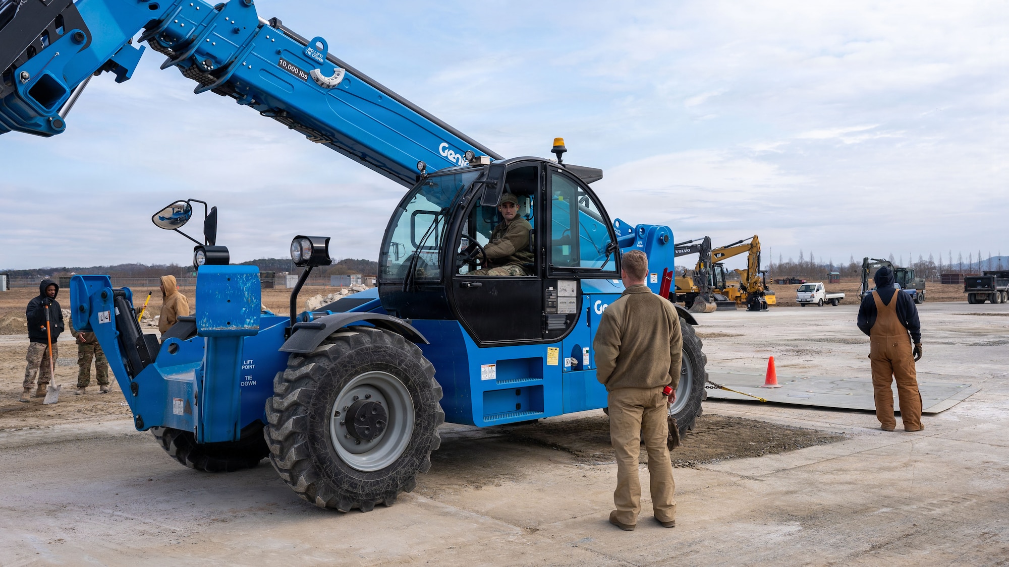U.S. Air Force Airmen assigned to the 51st Civil Engineer Squadron pull a fiber reinforced panel during Rapid Osan Airfield Recovery training at Osan Air Base, Republic of Korea, Feb. 27, 2026. The panel-based technique is designed to rapidly return the runway to operational status in support of aircraft launch operations. (U.S. Air Force photo by Senior Airman Rome Bowermaster)