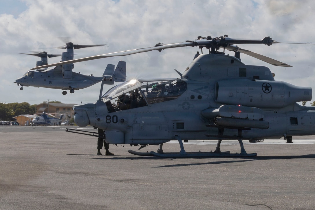 U.S. Marines with Marine Light Attack Helicopter Squadron (HMLA) 269, Marine Aircraft Group 29, 2nd Marine Aircraft Wing, and Marine Medium Tiltrotor Squadron (VMM) 261, MAG-26, 2nd MAW, prepare for takeoff during MAG-29 Distributed Aviation Operations Exercise at the U.S. Navy’s Atlantic Undersea Test and Evaluation Center, Andros Island, The Bahamas, Feb 15, 2026. MAG-29 DAO Exercise is a multi-week exercise designed to distribute command and control aviation forces, pushing authorities to the lowest levels while keeping forces moving between airfields and air sites. MAG-29 DAO is set to take place across the southeastern U.S. and the Caribbean, including North Carolina, South Carolina, Georgia, Florida and The Bahamas. (U.S. Marine Corps photo by Lance Cpl. Bryan Giraldo)