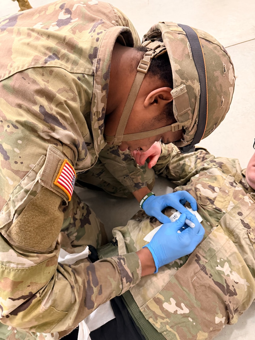 photo of soldier performing medical training during a medic recertification course.