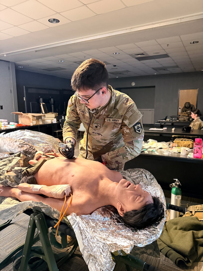 photo of soldier performing medical training during a medic recertification course.