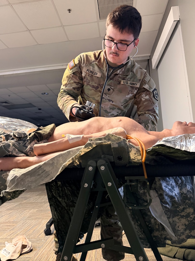 photo of soldier performing medical training during a medic recertification course.
