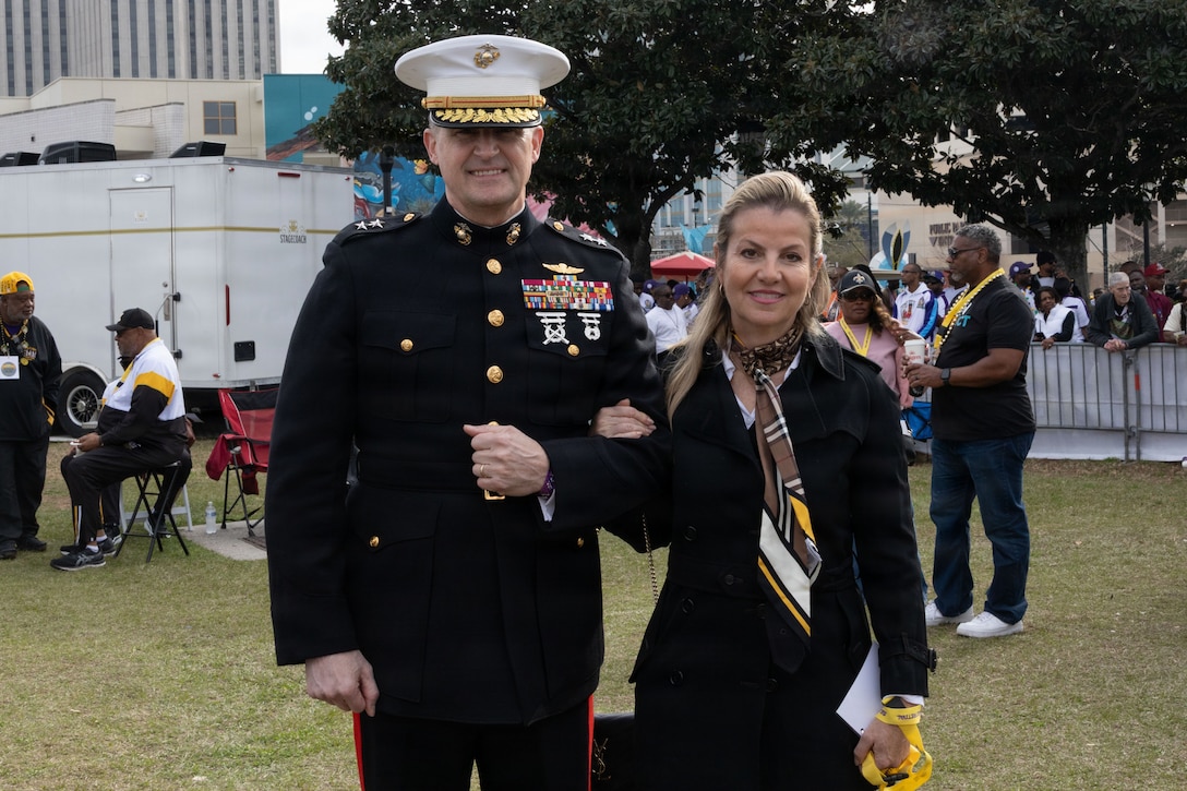 U.S. Marine Corps Maj. Gen. Douglas Clark, deputy commander of Marine Forces Reserve and Marine Forces South, poses for a photo with his wife Mrs. Valerie Clark during Lundi Gras Festival at Woldenberg Park, Feb. 16, 2026. Maj. Gen. Clark celebrated Lundi Gras with the Zulu Social Aid and Pleasure Club, emphasizing the tradition and long-standing partnership built over the years. (U.S. Marine Corps photo by Sgt. Emily De La Torre)