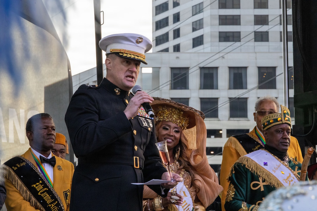 U.S. Marine Corps Maj. Gen. Douglas Clark, deputy commander of Marine Forces Reserve and Marine Forces South, speaks to the crowd during Lundi Gras Festival at Woldenberg Park, New Orleans, Feb. 16, 2026. Maj. Gen. Clark celebrated Lundi Gras with the Zulu Social Aid and Pleasure Club, emphasizing the tradition and long-standing partnership built over the years. (U.S. Marine Corps photo by Sgt. Emily De La Torre)