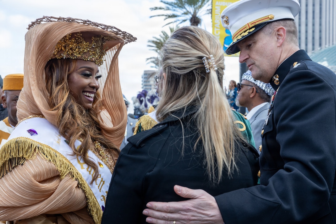 U.S. Marine Corps Maj. Gen. Douglas Clark, deputy commander of Marine Forces Reserve and Marine Forces South, and his wife Mrs. Valerie Clark, greet the 2026 Zulu King, Dr. Ron Tassin, and the 2026 Zulu Queen, Ms. Sharell Monique Chatman, during Lundi Gras Festival at Woldenberg Park, Feb. 16, 2026. Maj. Gen. Clark celebrated Lundi Gras with the Zulu Social Aid and Pleasure Club, emphasizing the tradition and long-standing partnership built over the years. (U.S. Marine Corps photo by Sgt. Emely Gonzalez)
