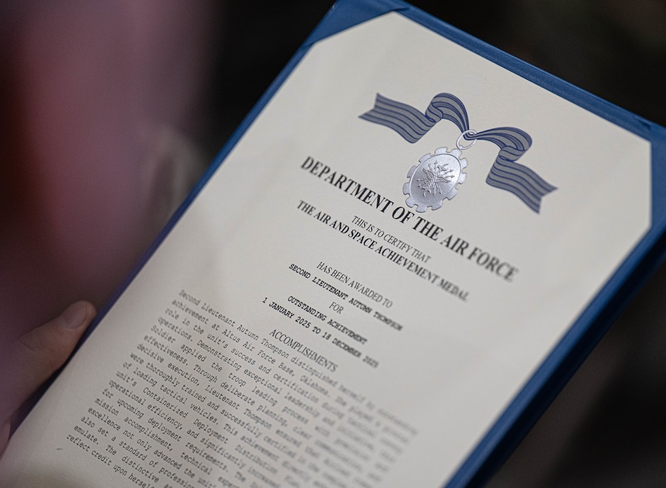 An Air and Space Achievement Medal is displayed at Altus Air Force Base, Oklahoma, March 4, 2026. As neighboring installations in Oklahoma, Altus Air Force Base and Fort Sill exemplify a unique regional representation of mutual support. (U.S. Air Force photo by Airman 1st Class Emma Wright)
