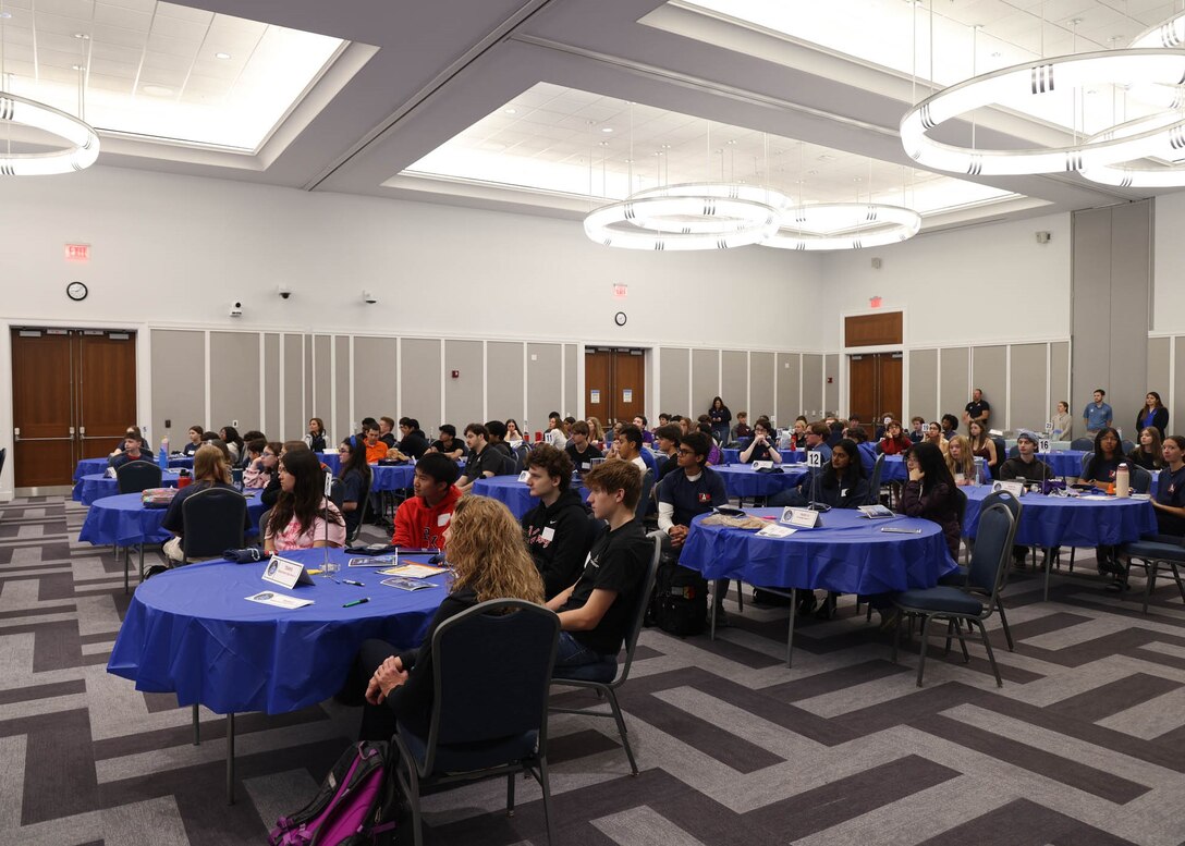Students from Allen D. Nease High School, Bishop Kenny High School, The Bolles School, Christ’s Church Academy, Creekside High School, First Coast High School, Fletcher High School and St. Mary’s Middle School gather in teams as the 24th Annual Engineering Career Day begins at the Jacksonville Main Public Library Feb. 27, 2026, in Jacksonville, Florida. Hosted by the Society of American Military Engineers Jacksonville Post in partnership with the U.S. Army Corps of Engineers Jacksonville District, the STEM competition brought together 90 Northeast Florida students to collaborate on hands-on engineering challenges designed to inspire future innovators. (U.S. Army Corps of Engineers photo by Aaron Church)
