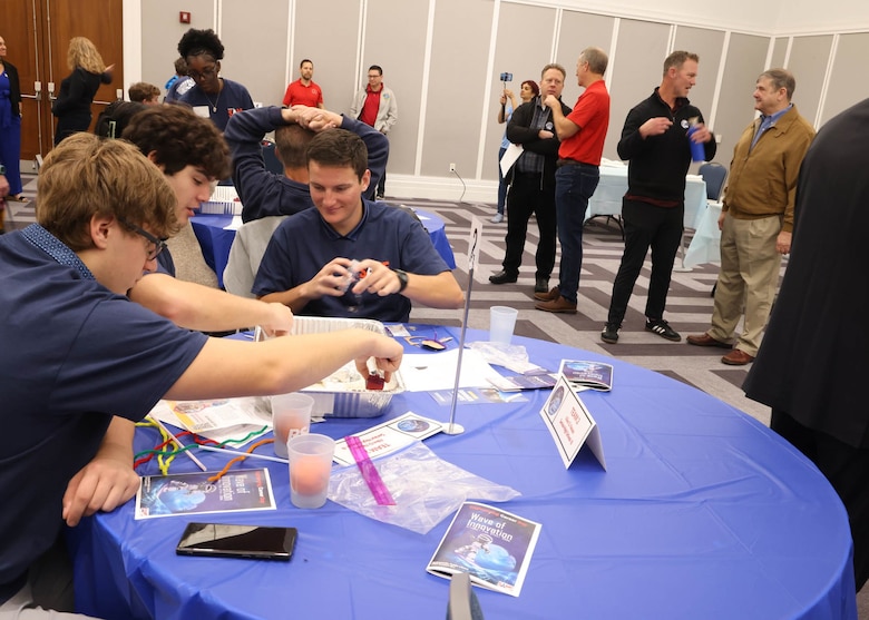 Students from Creekside High School construct shoreline protection barriers during the second “Surprise Problem” challenge at the 24th Annual Engineering Career Day Feb. 27, 2026, in Jacksonville, Florida. The exercise simulated coastal engineering principles by requiring teams to design structures capable of protecting model homes from simulated wave energy and shoreline erosion. (U.S. Army Corps of Engineers photo by Public Affairs Specialist Misty Cunningham)