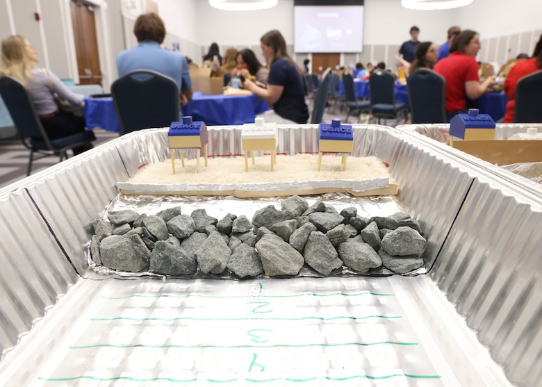 A close-up view highlights riprap-style barriers and shoreline stabilization designs created by students from Fletcher High School during the coastal erosion challenge at the 24th Annual Engineering Career Day Feb. 27, 2026, in Jacksonville, Florida. The activity introduced participants to engineering techniques commonly used to absorb wave energy and protect coastal communities. (U.S. Army Corps of Engineers photo by Public Affairs Specialist Misty Cunningham)