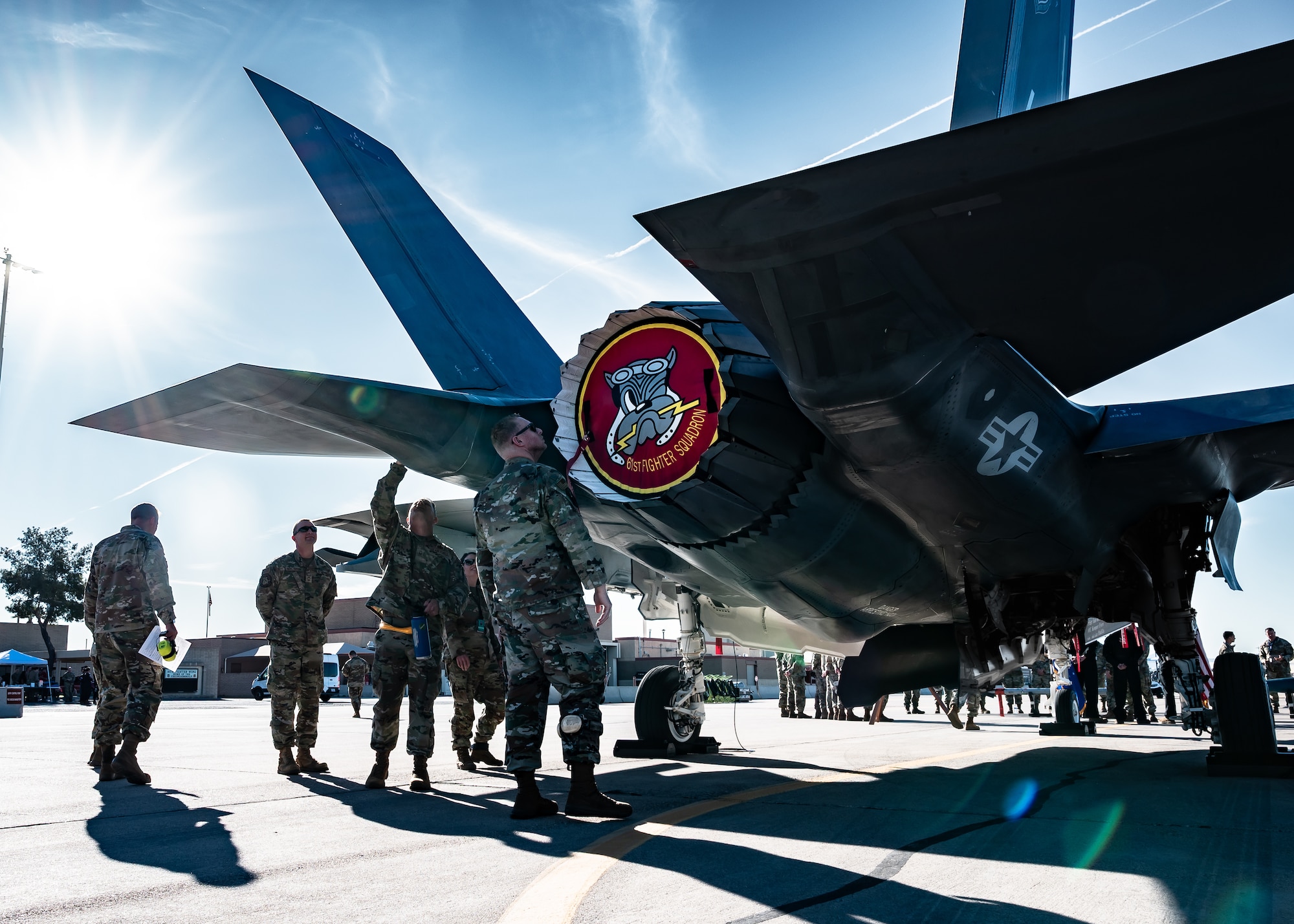 U.S. Air Force Airmen assigned to the 56th Fighter Wing assess the maintenance condition of an F-35A Lightning II assigned to the 61st Fighter Squadron during a Dedicated Crew Chief competition