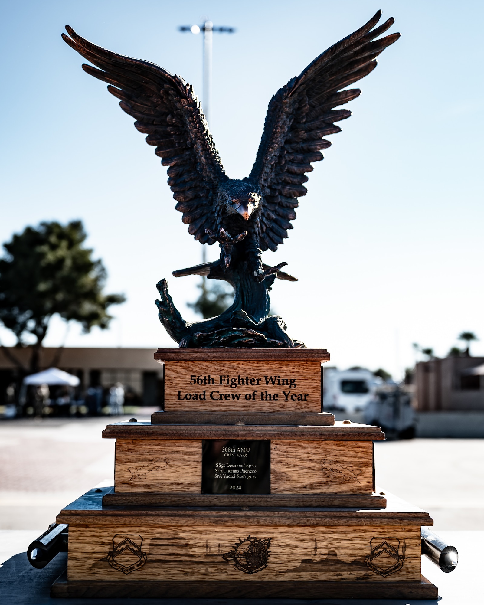 A physical trophy stands on display during a Dedicated Crew Chief competition