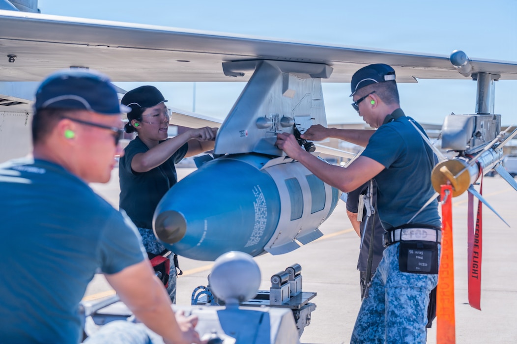 Royal Singaporean Air Force weapons load crew members assigned to the 425th Aircraft Maintenance Unit participate in an annual weapons load competition, Feb. 27, 2026, at Luke Air Force Base, Arizona.