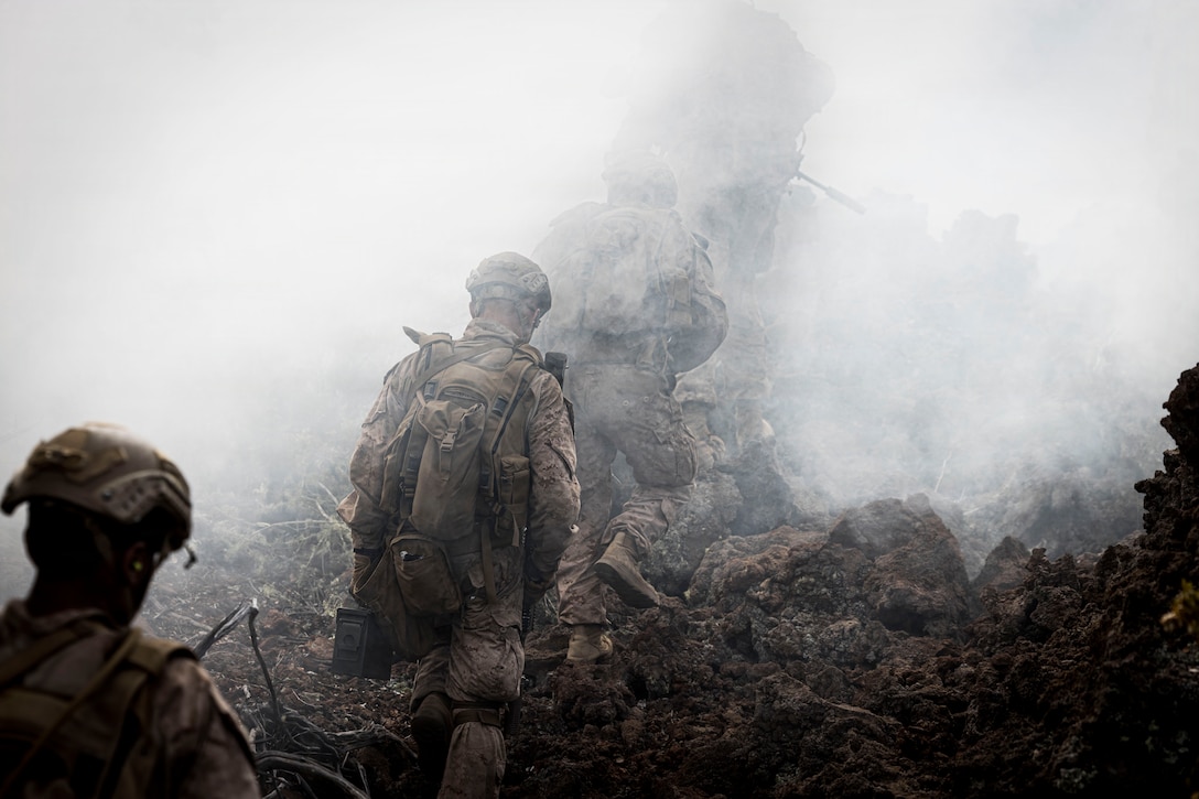 U.S. Marines with 3rd Littoral Combat Team, 3rd Marine Littoral Regiment, 3rd Marine Division, maneuver toward an objective during a live-fire training event at Pohakuloa Training Area, Hawaii, Feb. 3, 2026. The training exercise at PTA refined weapon system and tactical proficiency, strengthening overall combat readiness and preparing 3rd LCT for future operational requirements. (U.S. Marine Corps photo by Sgt. Iyer Ramakrishna)