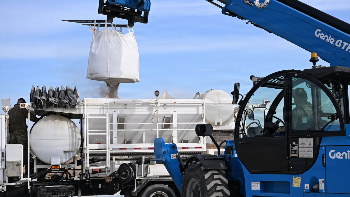 U.S. Air Force Airmen assigned to the 51st Civil Engineer Squadron mix concrete powder and water in a volumetric mixer during Rapid Osan Airfield Recovery training at Osan Air Base, Republic of Korea, Feb. 26, 2026. The training evaluated ROAR, an installation-specific method focused on restoring minimum runway capability quickly during contingency operations. (U.S. Air Force photo by Senior Airman Rome Bowermaster)