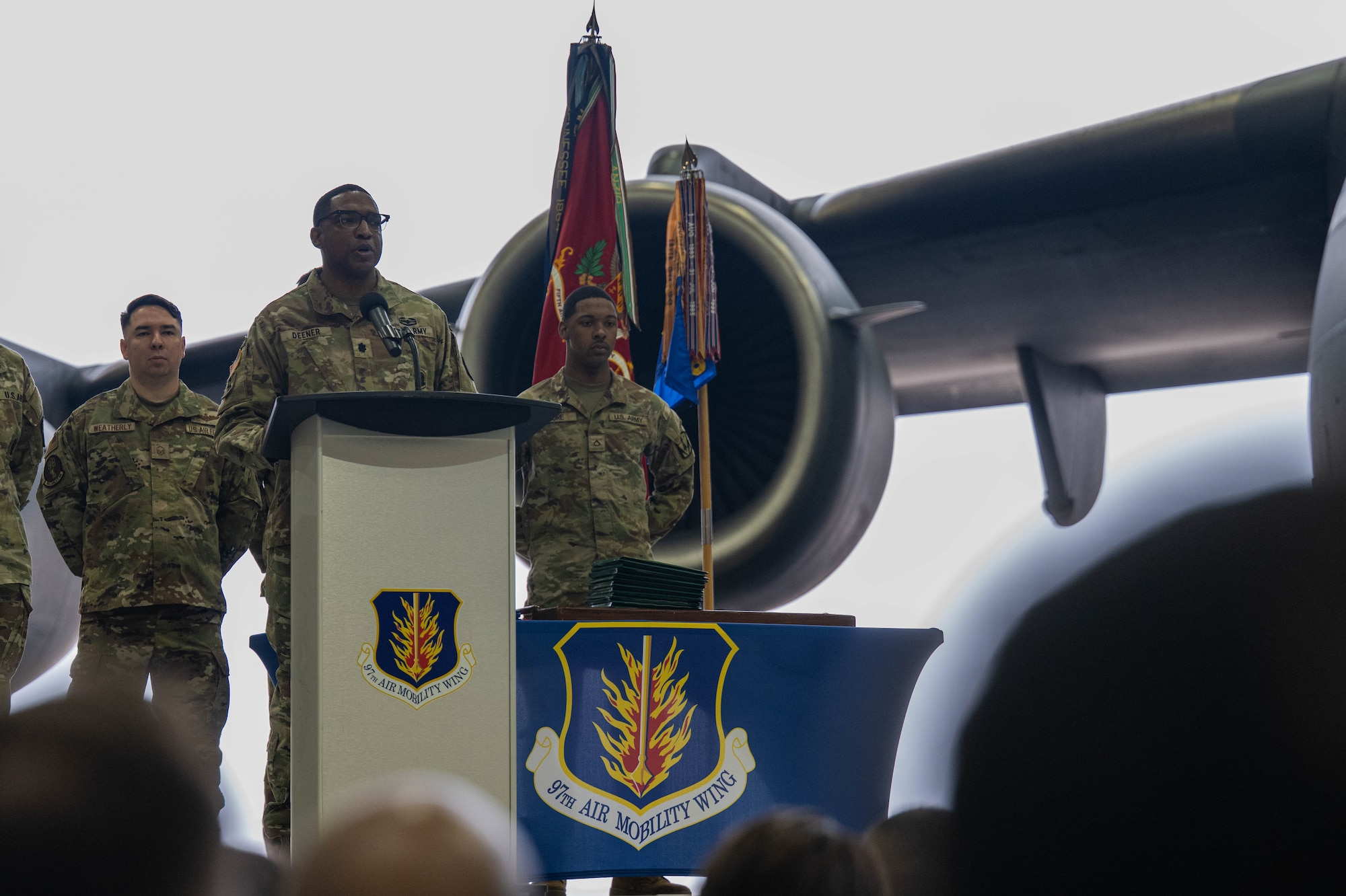 U.S. Army Lt Col. Dewayne Deener, commanding officer of the 5-5 Air Defense Artillery Battalion, speaks at a Joint Medals Ceremony at Altus Air Force Base, Oklahoma, March 4, 2026. When all participants, not just U.S. Air Force loadmasters, understand and can execute proper loading procedures, the safety of the aircrew and equipment increases exponentially. (U.S. Air Force photo by Airman 1st Class Emma Wright)