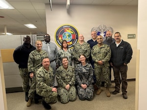 Subject Matter Experts from across Navy Medicine gathered at the Naval Medical Readiness Logistics Command Detachment Fort Detrick to perform a detailed review of the Authorized Medical Allowance List concerning pharmacy and anesthesia, vital components for Role 3 medical care. From Left to right: HM1 Emmanuel Dei, Mr. Germaine Haywood, Mrs. Mindy Scruggs (DHA), Mr. Ryan Lloyd, Mr. Charles Elliot (MSC), Capt. Noel Koenig (USNS Mercy), Lt. Cmdr. Chirag Patel, Mr. Mario Brito, Lt. Johnathan Oliva (USNS Mercy), HM1 Katlyn Schrecengost, Royal Navy LEUT Josephine Hancock