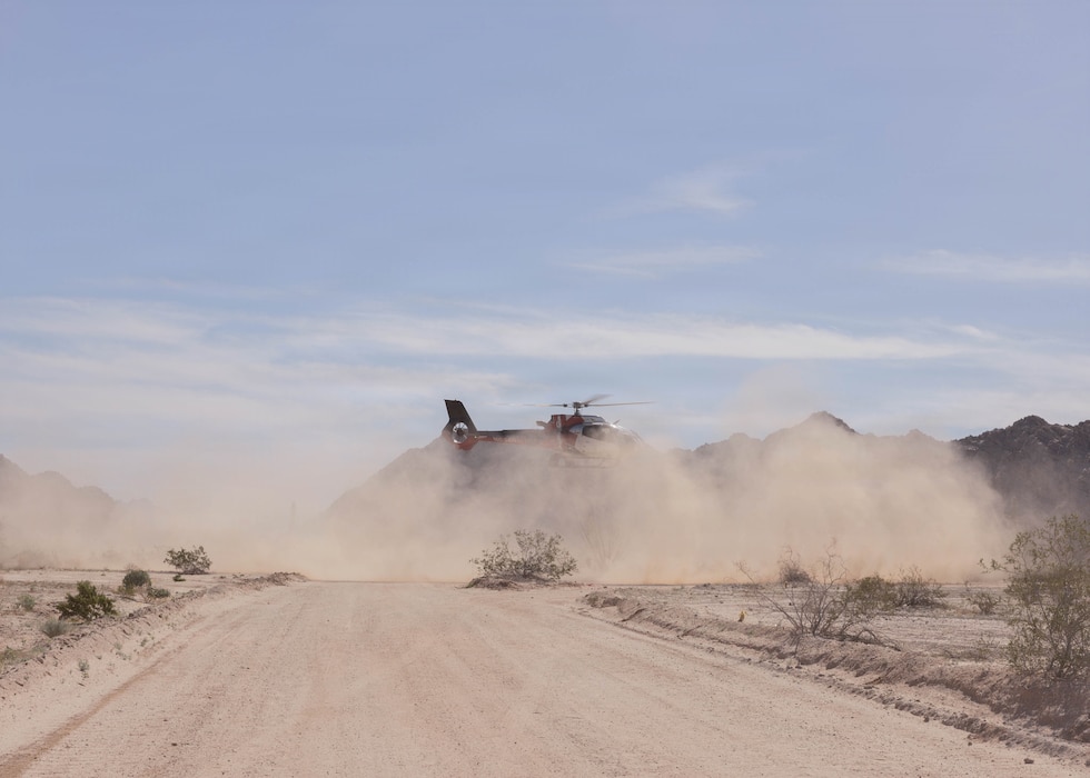 An Airbus H130 helicopter departs with a simulated casualty during a medical evacuation training exercise with AeroCare Medical Transport in Yuma, Ariz., Feb. 7, 2026. Joint training ensures that Joint Task Force-Southern Border (JTF-SB) personnel are prepared to work with AeroCare Medical Transport teams if a medical emergency occurs in remote area along the southern border. U.S. Northern Command is working side-by-side with the Department of Homeland Security and the U.S. Customs and Border Protection within narrowly defined authorities to provide unique military capabilities to protect the territorial integrity of the U.S. southern border. (U.S. Marine Corps photo by Lance Cpl. Stella Tedesco)