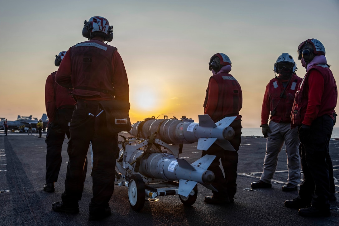 U.S. Sailors prepare ordnance on the flight deck of Nimitz-class aircraft carrier USS Abraham Lincoln (CVN 72) in support of Operation Epic Fury, Mar. 4, 2026. (U.S. Navy photo)