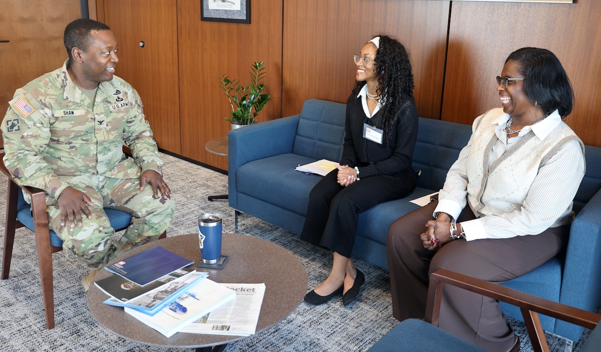 Harmoni Sanders, Mary G. Montgomery High School student, center, listens as U.S. Army Corps of Engineers, Mobile District, commander Col. Kelcey Shaw speaks about the District with LaTonya Campbell, program analyst, at the District headquarters in Mobile, Alabama, Feb. 19, 2026. Shaw explained the benefits of USACE and the opportunities a career with the agency can offer. (U.S. Army photo by Keesha Robinson)