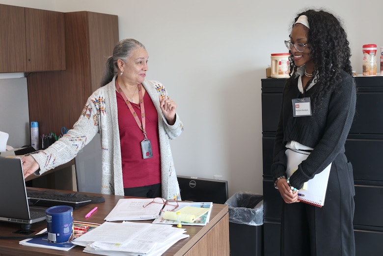 Lita Trotter, U.S. Army Corps of Engineers, Mobile District supervisory accountant, shows Harmoni Sanders, Mary G. Montgomery High School student, a document demonstrating program analysis at the District Headquarters in Mobile, Alabama, Feb. 19, 2026. Trotter said it is important for the District to recruit young talent like Sanders to keep the mission moving forward. (U.S. Army photo by Keesha Robinson)