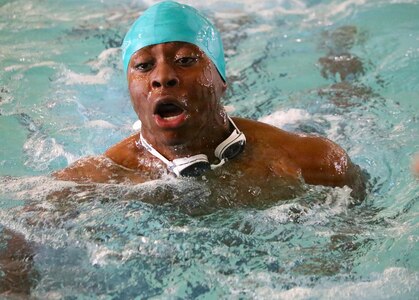U.S. Army Spc. Delas Bush comes up for air during a swimming training session, Feb. 28, 2026, at the Aquatics Training Center, Fort Bliss, Texas, during the 2026 Army Recovery Care Program’s Army Trials.