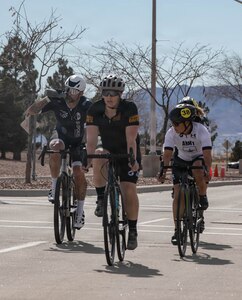 U.S. Army Veteran Kyra Maggio, No. 38, pedals alongside fellow vets as they work toward the finish line as part of Army Trials 2026, March 1, 2026, at Fort Bliss, Texas.