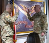 Col. Matthew Garrison, Chief of the Illinois National Guard Joint Staff, administers the oath of office to newly promoted Maj. Aaron Bryant during a promotion ceremony March 5 at the Illinois State Military Museum in Springfield.
