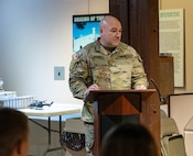 Newly promoted Maj. Aaron Bryant thanks friends and family for their support throughout his military career during a promotion ceremony March 5 at the Illinois State Military Museum in Springfield.