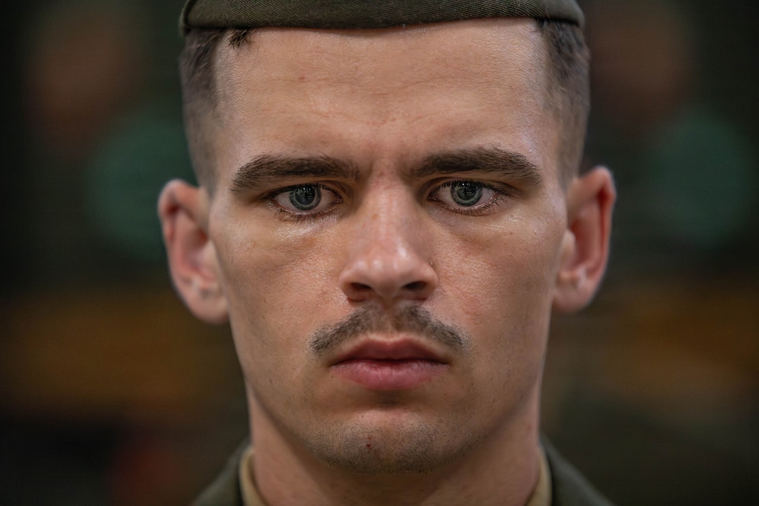 U.S. Marine Corps Lance Cpl. Christian Meadows, a patrolman with Headquarters Battalion, Marine Forces Reserve, stands at the position of attention during a uniform inspection, Marine Corps Support Facility New Orleans, Feb. 27, 2026. The inspection was conducted to evaluate the Marines’ appearance and adherence to standards while promoting discipline and attention to detail. (U.S. Marine Corps photo by Lance Cpl. Van Hoang)