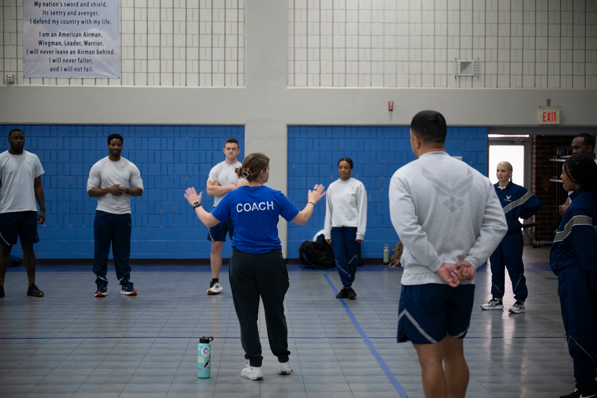 A U.S. Air Force expert fitness specialist talks with students while attending the Master Fitness Leader course, February 24, 2026, at McGhee Tyson Air National Guard Base, Tennessee. The I.G. Brown Training and Education Center hosted the inaugural Master Fitness Leader course, bringing together Total Force Airmen and civilians for the first offering of the new training program.