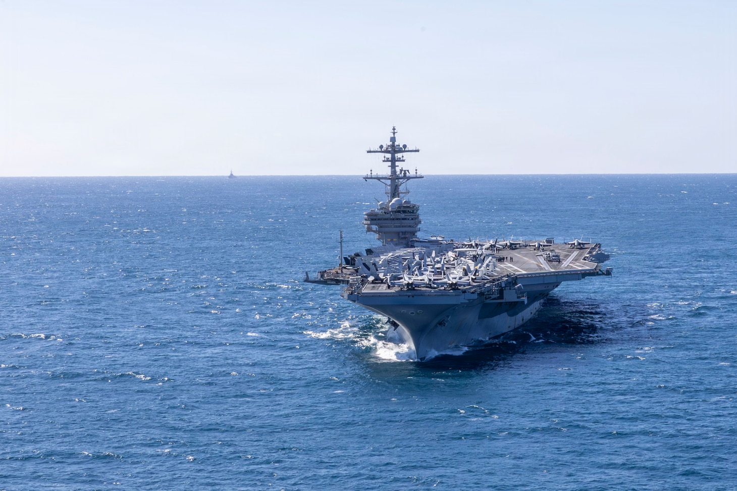 The Nimitz-class aircraft carrier USS George H.W. Bush transits the Atlantic Ocean, Feb. 8, 2026. The George H.W. Bush Carrier Strike Group is at sea training as an integrated warfighting team. Composite Training Unit Exercise (COMPTUEX) is the Joint Force’s most complex integrated training event and prepares naval task forces for sustained high-end Joint and combined combat. Integrated naval training provides combatant commanders and America’s civilian leaders highly capable forces that deter adversaries, underpin American security and economic prosperity, and reassure Allies and partners. (U.S. Navy photo by Mass Communication Specialist 2nd Class Jayden Brown)