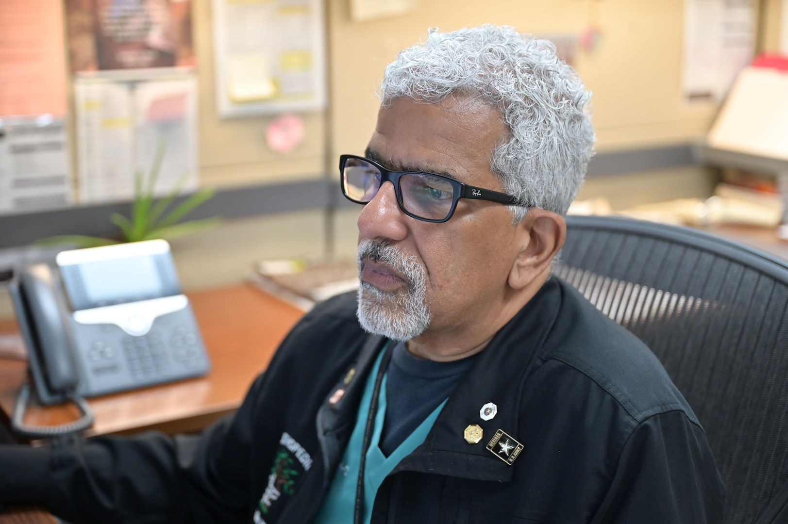 Alex Morales, an orthopedic physician assistant at Carl R. Darnall Army Medical Center, reviews patient information before an appointment in the Orthopedic Clinic. Morales has practiced orthopedics at CRDAMC for more than two decades.
