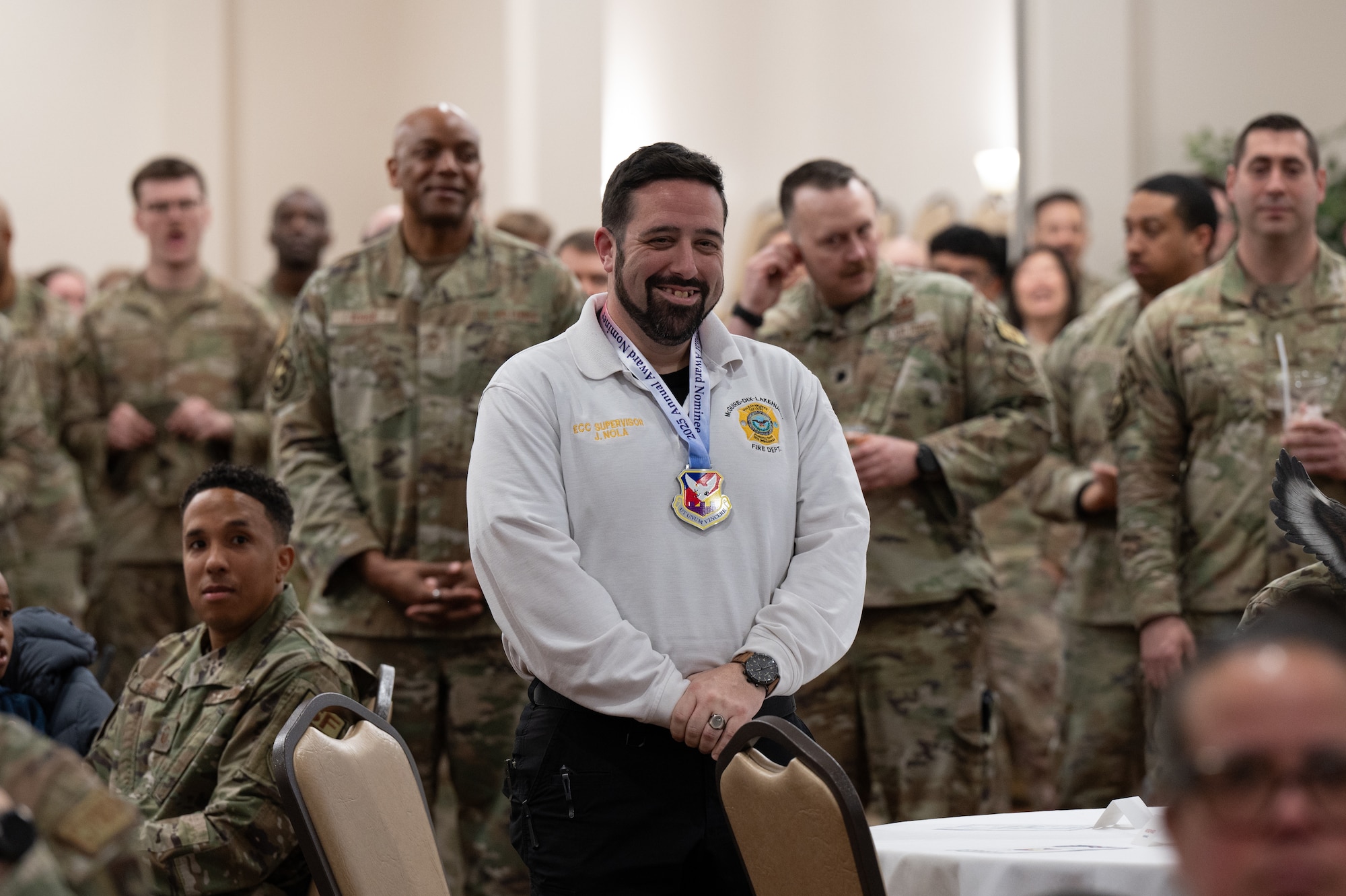 Joshua Nola, 87th Civil Engineer Group dispatch supervisor, is recognized during the 87th Air Base Wing 2025 annual awards ceremony at Joint Base McGuire-Dix-Lakehurst, N.J., Feb. 26, 2026.