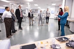Michael J. Holthe, Principal Deputy Assistant Secretary of War for Science and Technology (third from L), visits the new BioFoundry at FDA's I-Teams facility in Laurel, Maryland.