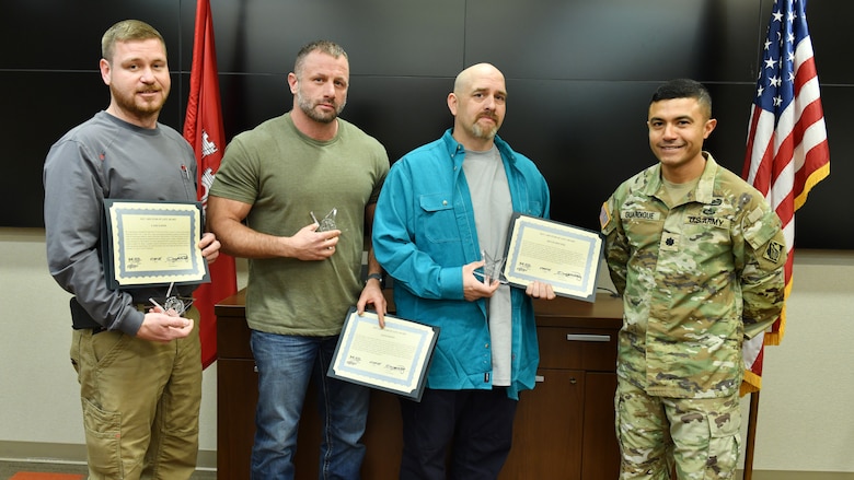 Lt. Col. Guillermo Guandique, U.S. Army Corps of Engineers Nashville District commander (Right), presents 2025 Star of Life Awards March 5, 2026, from the USACE Great Lakes and Ohio River Division commander to Case Eaton (Left), Alex Hays (Second from Left), and Kevin Reuter during a ceremony at the district headquarters in Nashville, Tennessee. The awards recognize this team’s combined efforts to rescue a distressed kayaker above Barkley Dam June 17, 2025, on the Cumberland River in Kuttawa, Kentucky. Chris Meeks was also recognized but not present at the ceremony. (USACE Photo by Summer Thatcher)