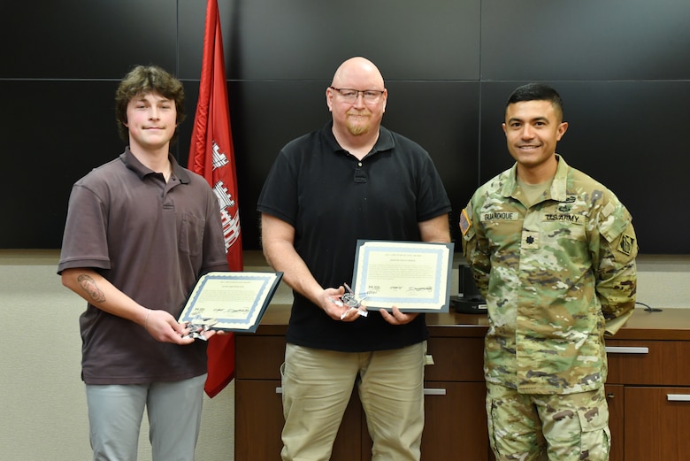 Lt. Col. Guillermo Guandique (Right), U.S. Army Corps of Engineers Nashville District commander (Right), presents the 2025 Star of Life Award March 5, 2026, from the USACE Great Lakes and Ohio River Division commander to Danny Brewington (Left) and Joseph Traughber during a ceremony at the district headquarters in Nashville, Tennessee. The award recognizes their efforts to throw a rope and haul a vessel without power and its passengers to safety at Cheatham Dam July 11, 2025, on the Cumberland River in Jamestown, Kentucky. (USACE Photo by Summer Thatcher)